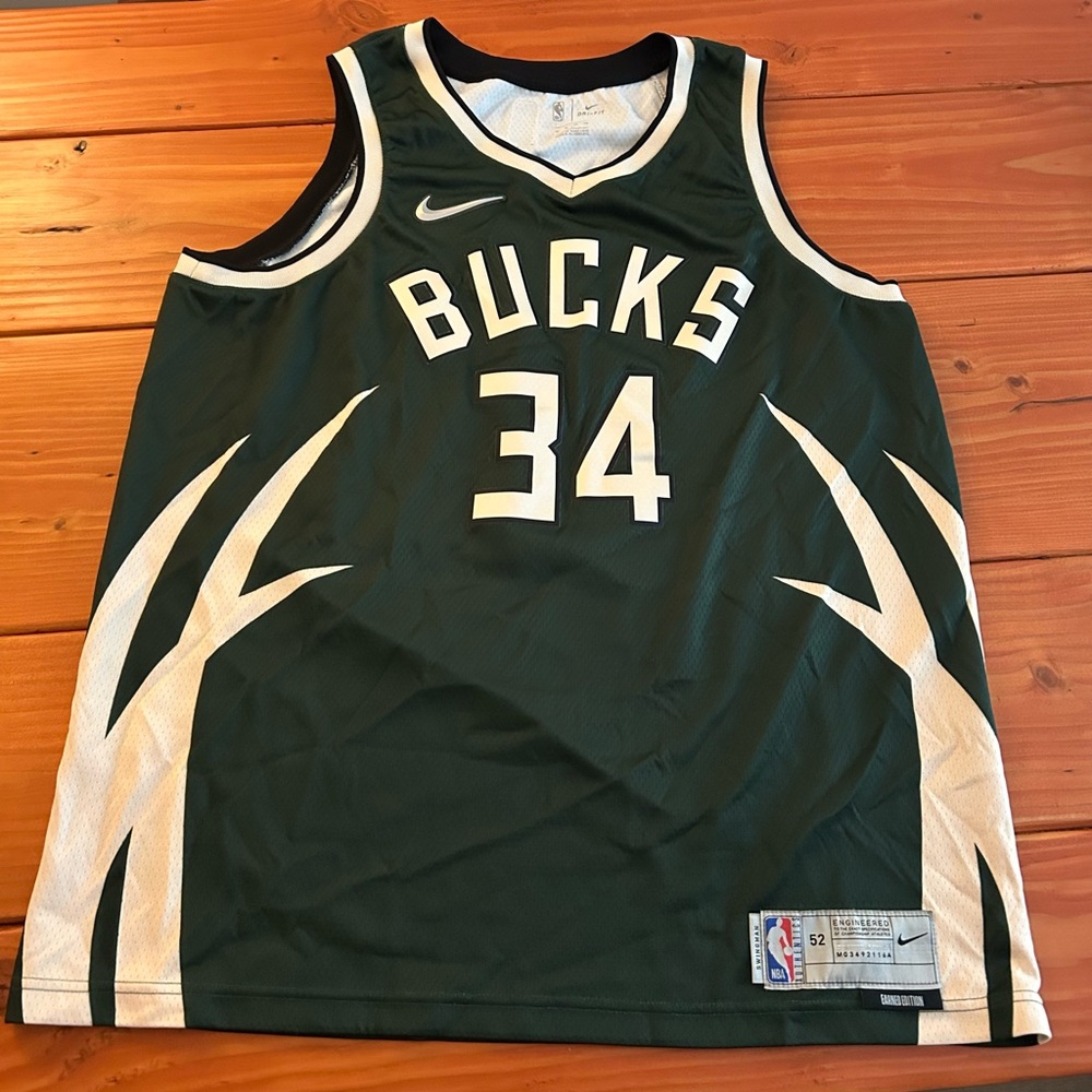Earned Edition Official Giannis Antetokoumpo Bucks Jersey Dark Green